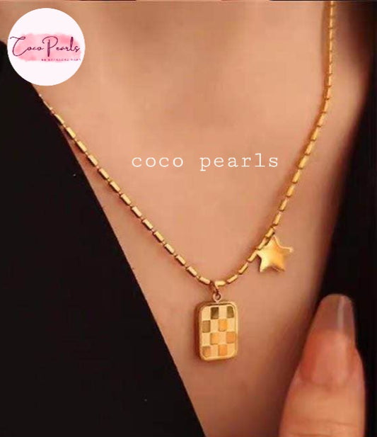 Coco Pearls Stainless Steel Anti Tarnish Gold necklace with star and checkered pendant on a person's neck