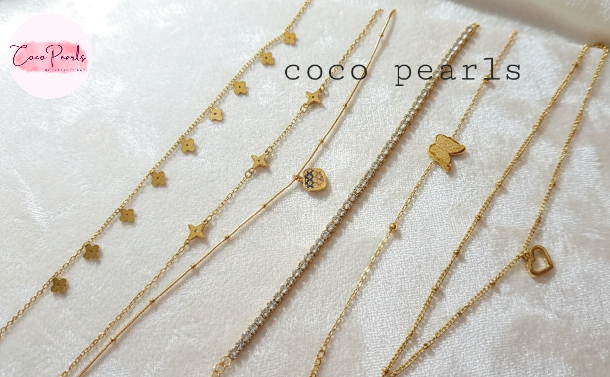 Coco Pearls Stainless Steel Anti Tarnish Gold bracelets and anklets on a white surface