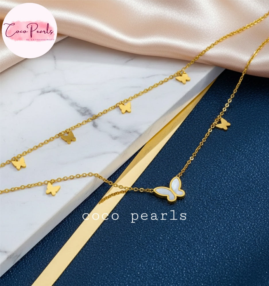 Coco Pearls Stainless Steel Anti Tarnish Gold butterfly bliss anklet on a marble surface