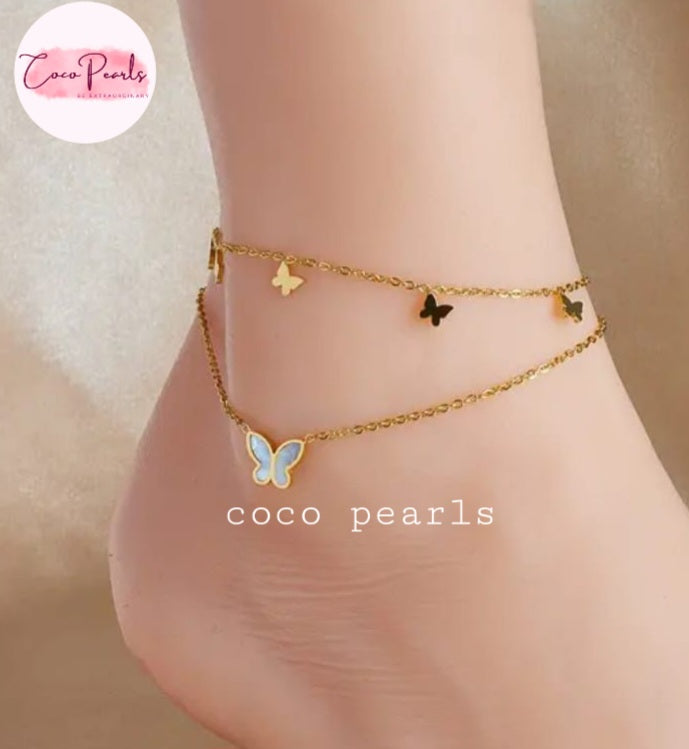 Coco Pearls Stainless Steel Anti Tarnish Gold butterfly bliss anklet with butterfly charms on a person's ankle