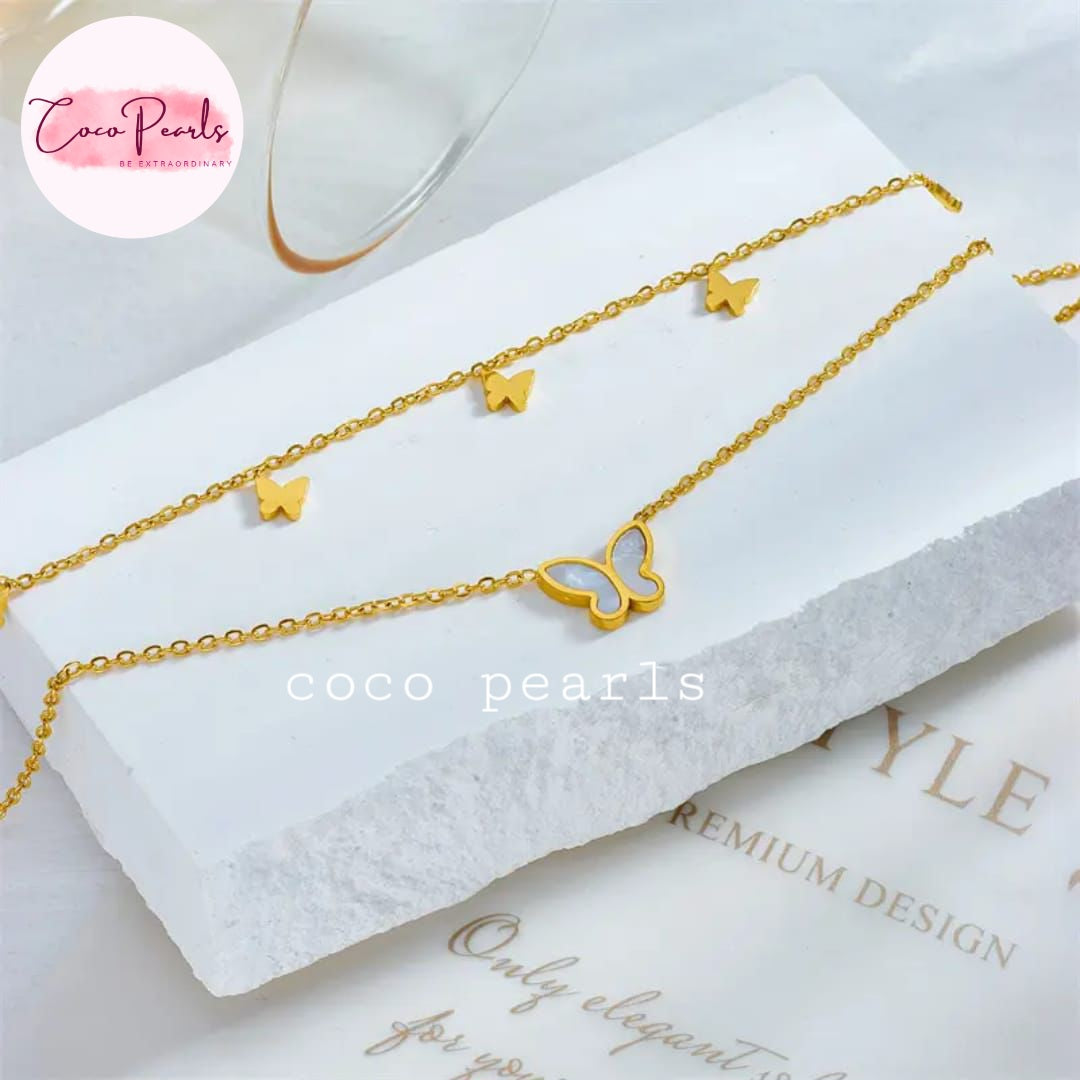 Coco Pearls Stainless Steel Anti Tarnish Gold butterfly bliss anklet  with big butterfly hanging charm on a white display card