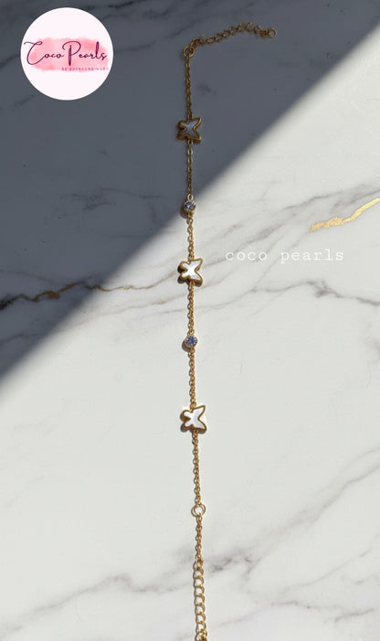 Coco Pearls Stainless Steel Anti Tarnish golden butterfly link bracelet with white butterflies and clear stones