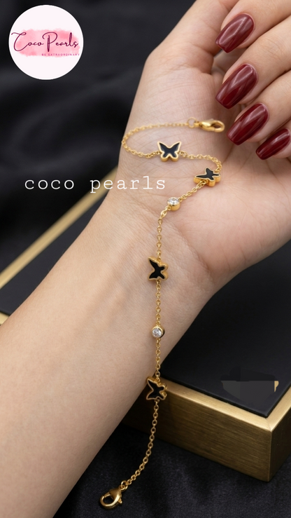 Coco Pearls Stainless Steel Anti Tarnish golden butterfly link bracelet with black butterflies and clear stones