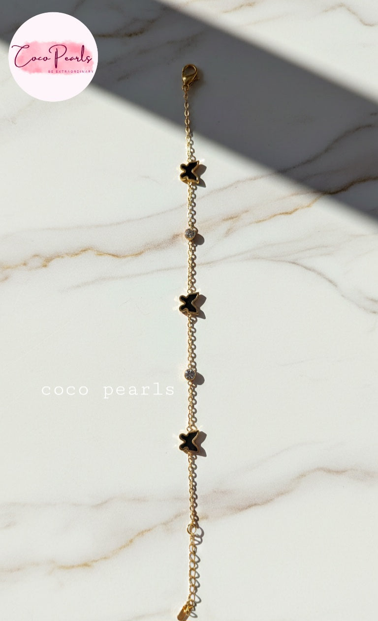 Coco Pearls Stainless Steel Anti Tarnish golden butterfly link bracelet with black butterflies and clear stones