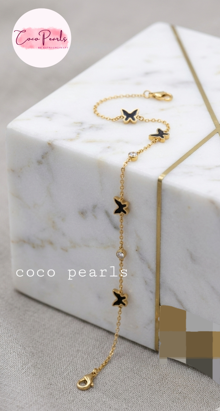 Coco Pearls Stainless Steel Anti Tarnish golden butterfly link bracelet with black butterflies and clear stones
