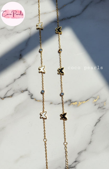 Coco Pearls Stainless Steel Anti Tarnish golden butterfly link bracelet with butterflies and studs in between available in black and white