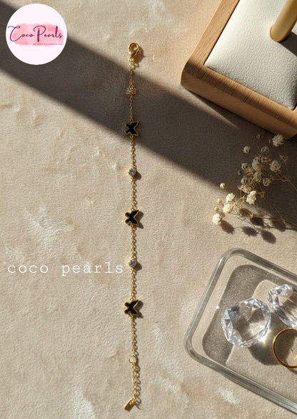 Coco Pearls Stainless Steel Anti Tarnish golden butterfly link bracelet with black butterflies and clear stones