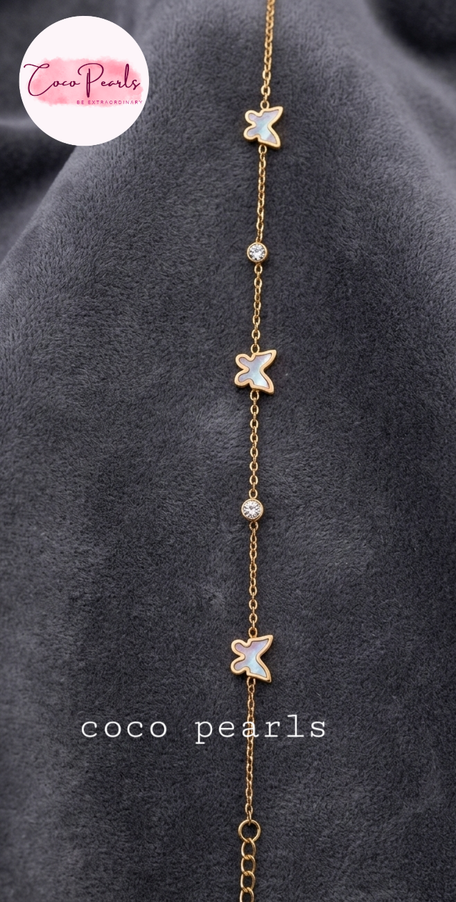 Coco Pearls Stainless Steel Anti Tarnish golden butterfly link bracelet with black butterflies and clear stones