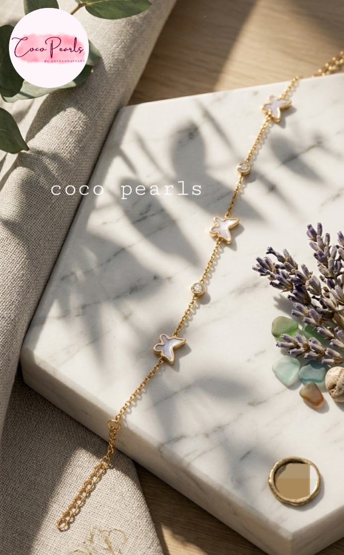 Coco Pearls Stainless Steel Anti Tarnish golden butterfly link bracelet with black butterflies and clear stones