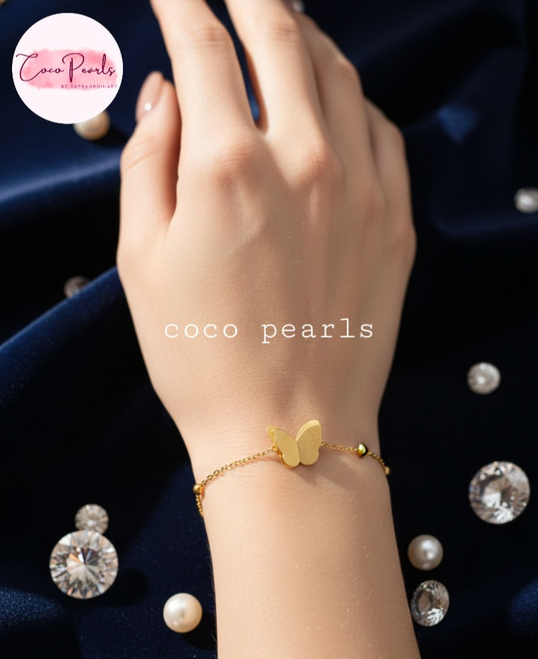 Coco Pearls Stainless Steel Anti Tarnish Gold butterfly whisper bracelet on hand