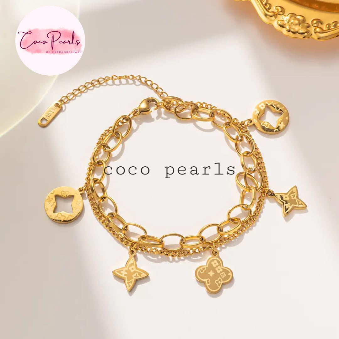 Coco Pearls Stainless steel anti tarnish Gold double layer bracelet with charms on a white background