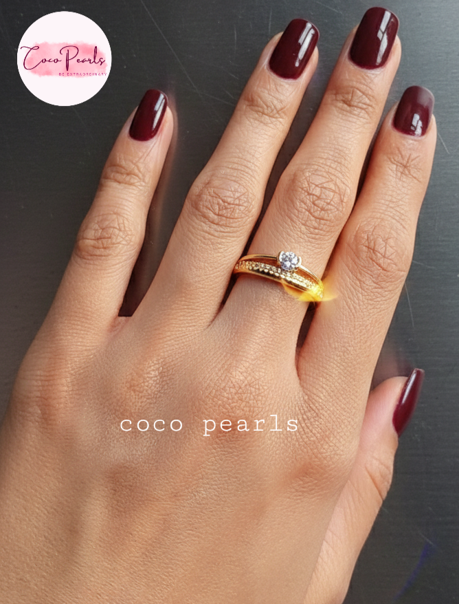 coco pearls stainless steel anti tarnish gold crown solitaire adjustable diamond studded ring displayed on hand