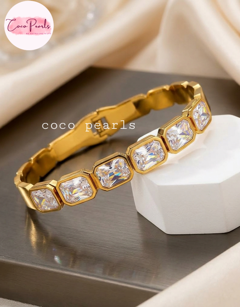 Anti tarnish stainless Steel Waterproof Gold bracelet with clear crystals on a neutral background, featuring the brand 'Coco Pearls'.