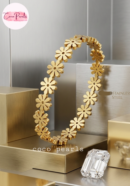 coco pearls stainless steel anti tarnish golden daisy chain handcuff with all over small flowers