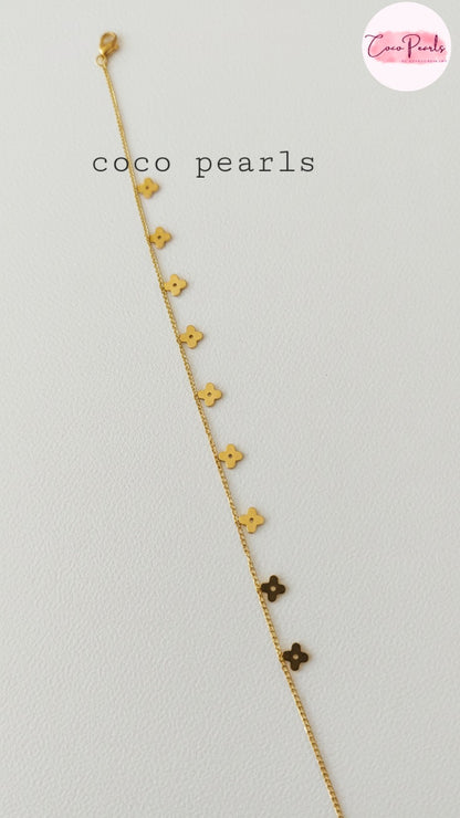 Coco Pearls Stainless Steel Anti Tarnish Gold delight anklet with small heart-shaped charms on a light gray background