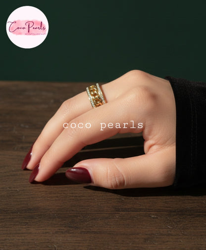 coco pearls stainless steel anti tarnish gold diamond studded with metal chain in center worn on hand