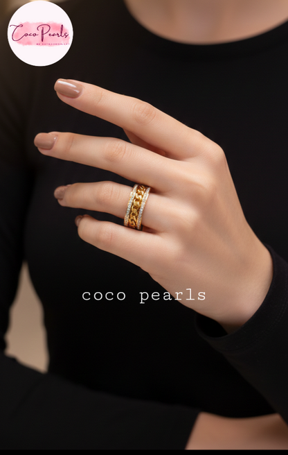 coco pearls stainless steel anti tarnish gold diamond studded with metal chain in center displayed on hand