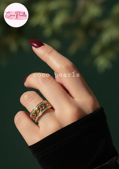 coco pearls stainless steel anti tarnish gold diamond studded with metal chain in center displayed on hand