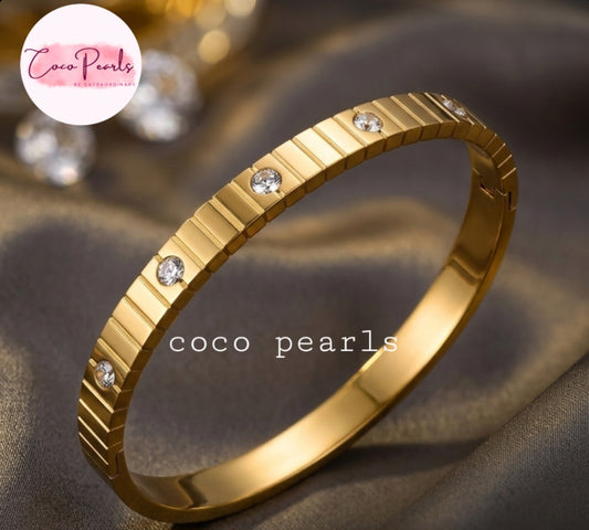 coco pearls stainless steel anti tarnish golden diamond striped handcuff bangle bracelet  diamond studded and striped