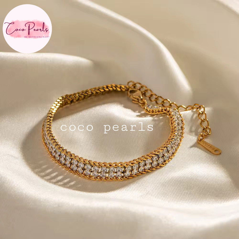 Coco Pearls Stainless Steel Anti Tarnish olden Radiance bracelet with two rhinestone lines displayed on white background