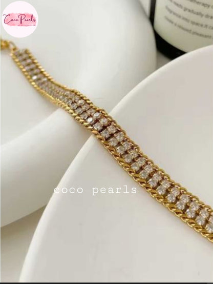Coco Pearls Stainless Steel Anti Tarnish golden Radiance bracelet with two stone lines displayed on white background