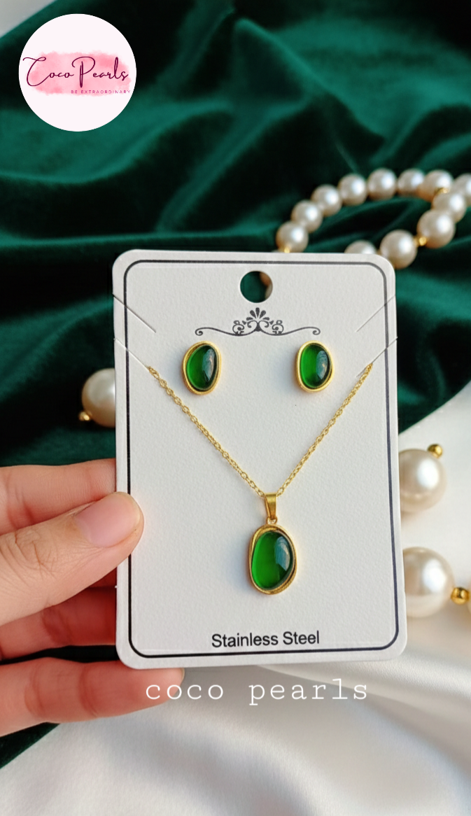 coco pearls stainless steel anti tarnish gold Jewelry set with green gemstones and gold accents on a card