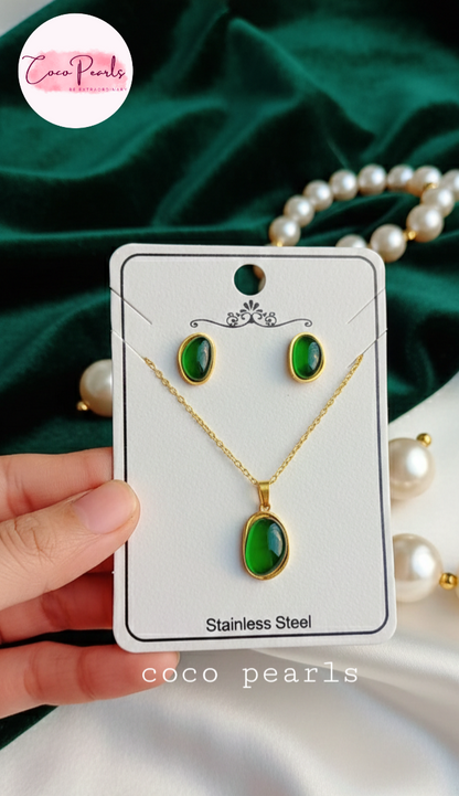 coco pearls stainless steel anti tarnish gold Jewelry set with green gemstones and gold accents on a card