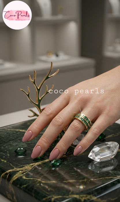 Coco pearls stainless Steel anti tarnish gold emerald empire band ring with twonlayers of emarald green zircon stones all over band displayed on hand