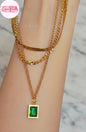Coco Pearls Stainless Steel Anti Tarnish Gold emerald trio triple chain necklace with a green pendant displayed on hand