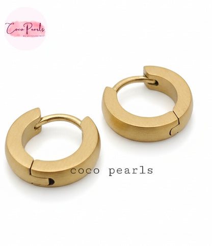 Coco Pearls Stainless Steel Anti Tarnish Golden barrel hoop earrings on a simple background