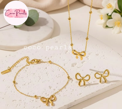 Coco Pearls Stainless Steel Anti tarnish Gold jewelry set with necklaces, bracelet, and earrings on a light background