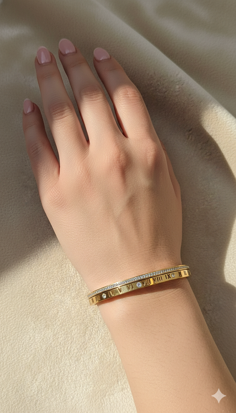 coco pearls stainless steel anti tarnish golden hour handcuff with roman number and diamond studded line displayed on hand