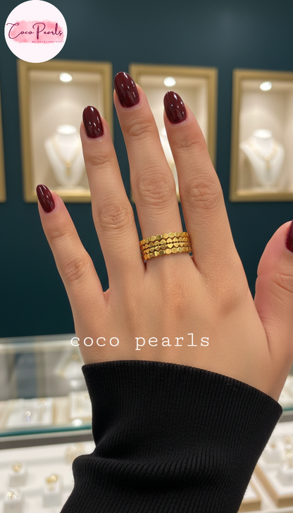 coco pearls stainless steel anti tarnish gold hive adjustable ring displayed o a hand