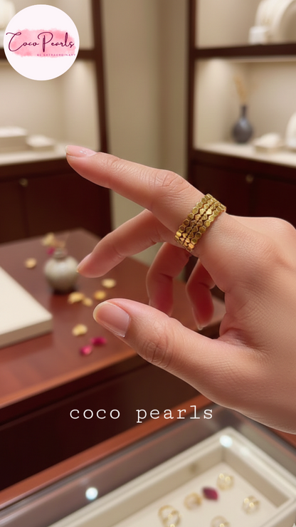 coco pearls stainless steel anti tarnish gold hive adjustable ring displayed on a finger