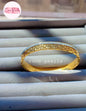 coco pearls stainless steel anti tarnish golden greco greek diamond studded handcuff displayed in a jewelry box