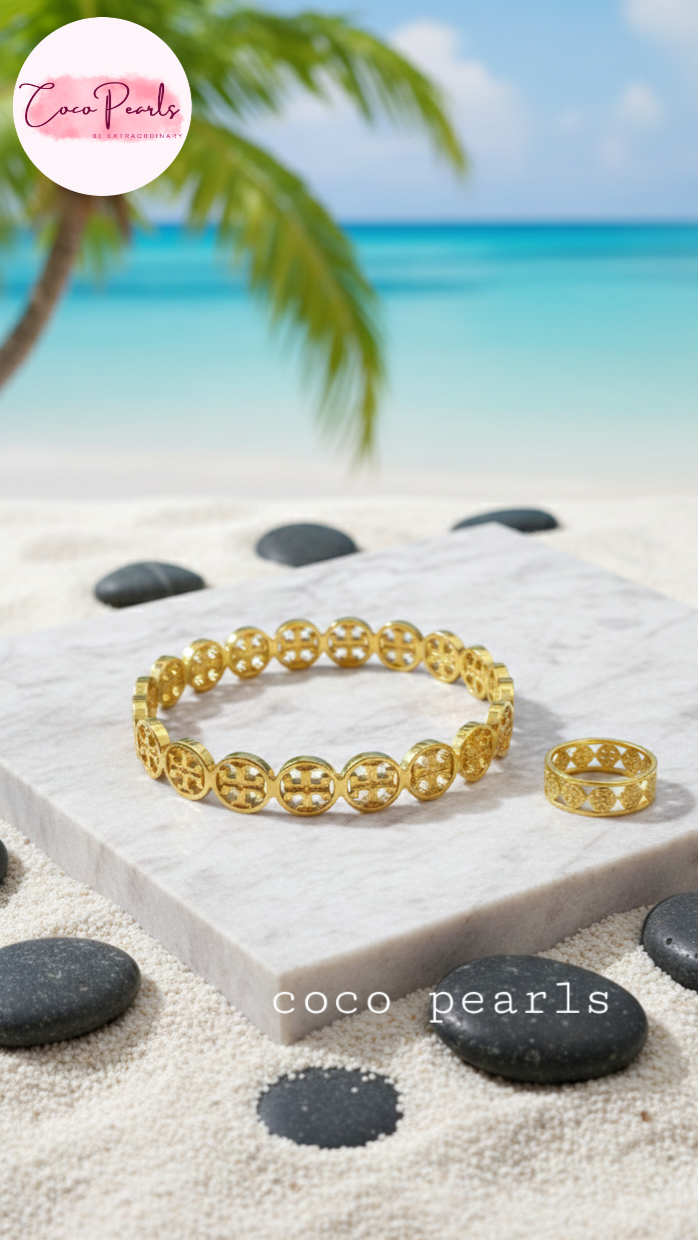 coco pearls stainless steel anti tarnish gold interlocking logo handcuff and ring with all over logos connected 