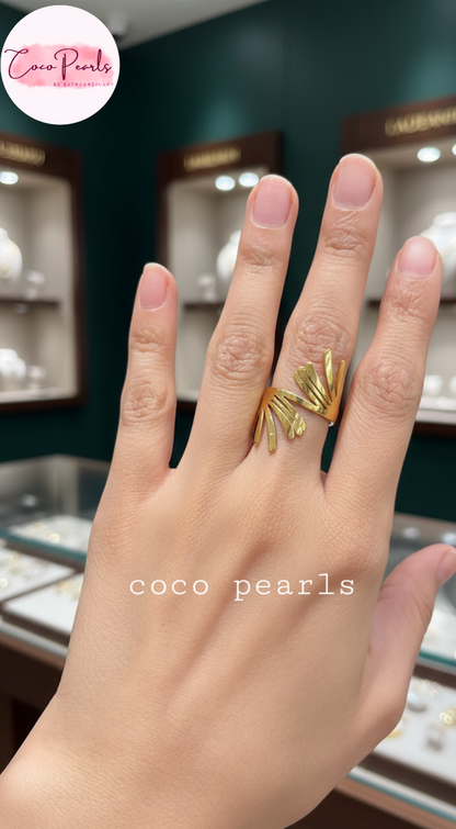 coco pearls stainless steel anti tarnish gold leaf burst ring displayed on hand