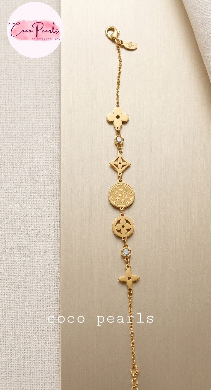 coco pearls stainless steel anti tarnish Gold lucky charm bracelet with intricate design