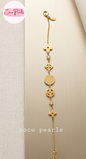 coco pearls stainless steel anti tarnish Gold lucky charm bracelet with intricate design