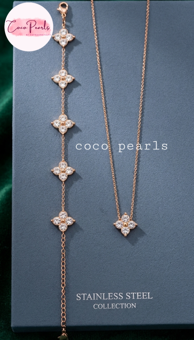 coco pearls stainless steel jewelry pakistan anti tarnish waterproof gold lucky four clover shaped diamond studded combo displayed on grey background