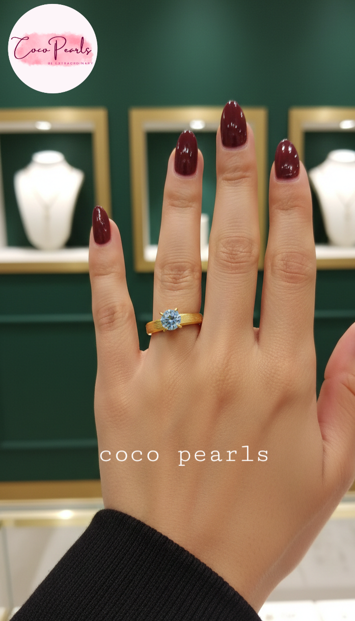 coco pearls stainless steel anti tarnish Gold luminous solitaire ring with a clear gemstone on hand