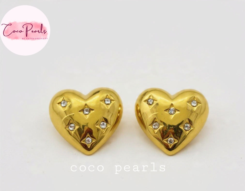 coco pearls stainless steel anti tarnish golden luxe heart sparkle diamond studded studs displayed on a white background