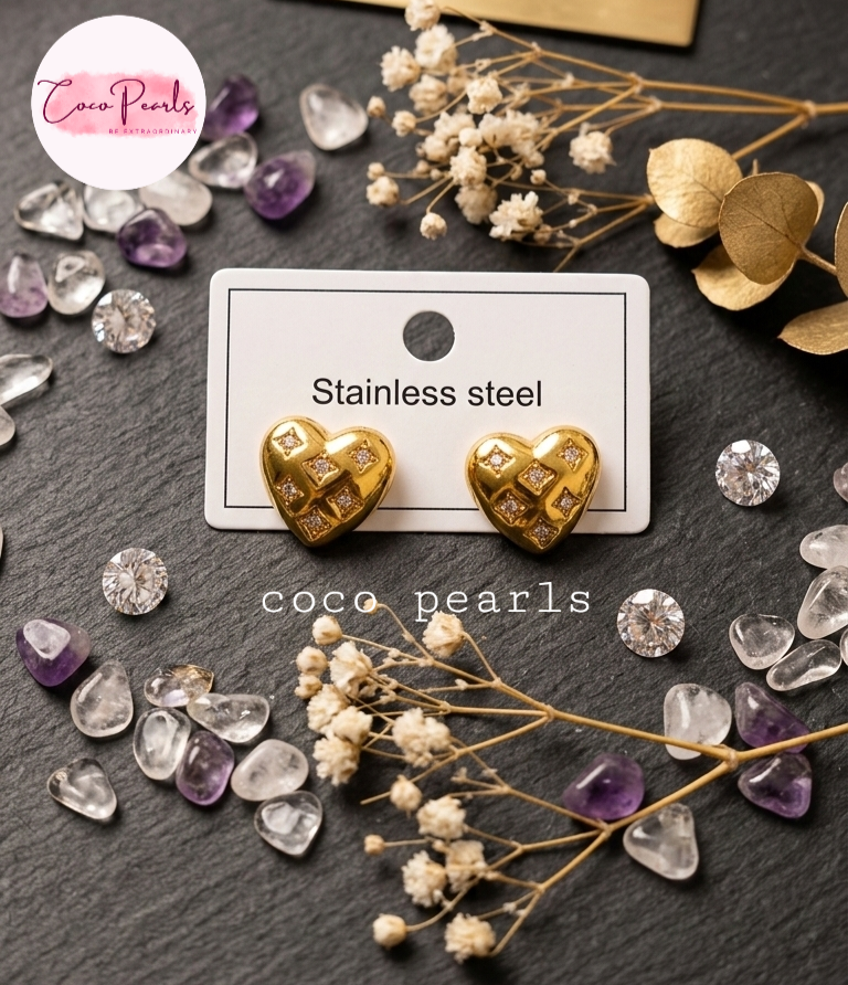 coco pearls stainless steel anti tarnish golden luxe heart sparkle diamond studded studs displayed on a white card