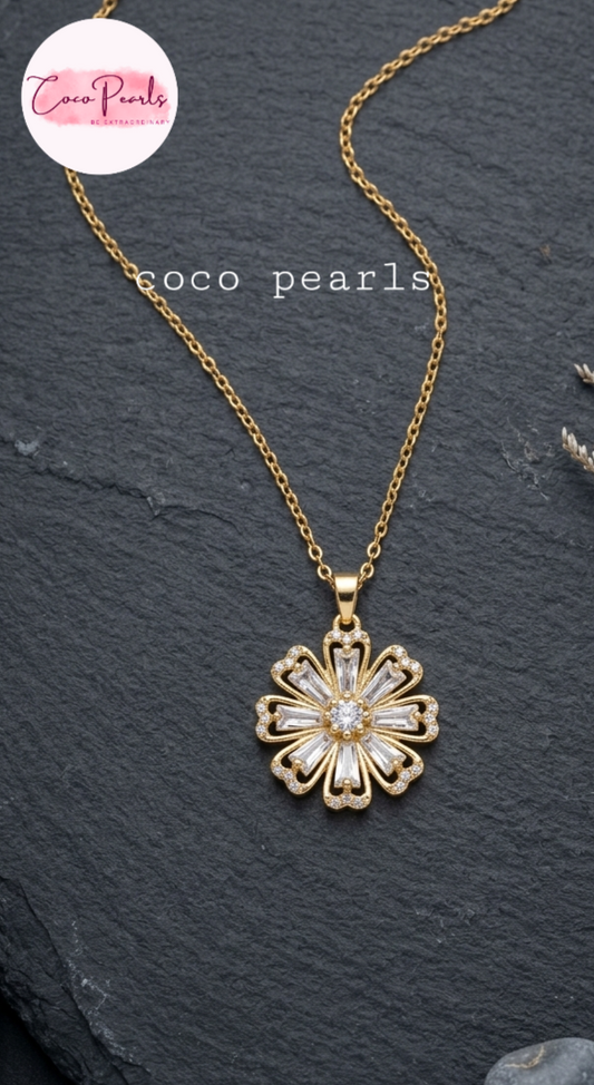 coco pearls stainless steel pakistan anti tarnish waterproof Gold luxury flower necklace with a floral pendant on a dark background