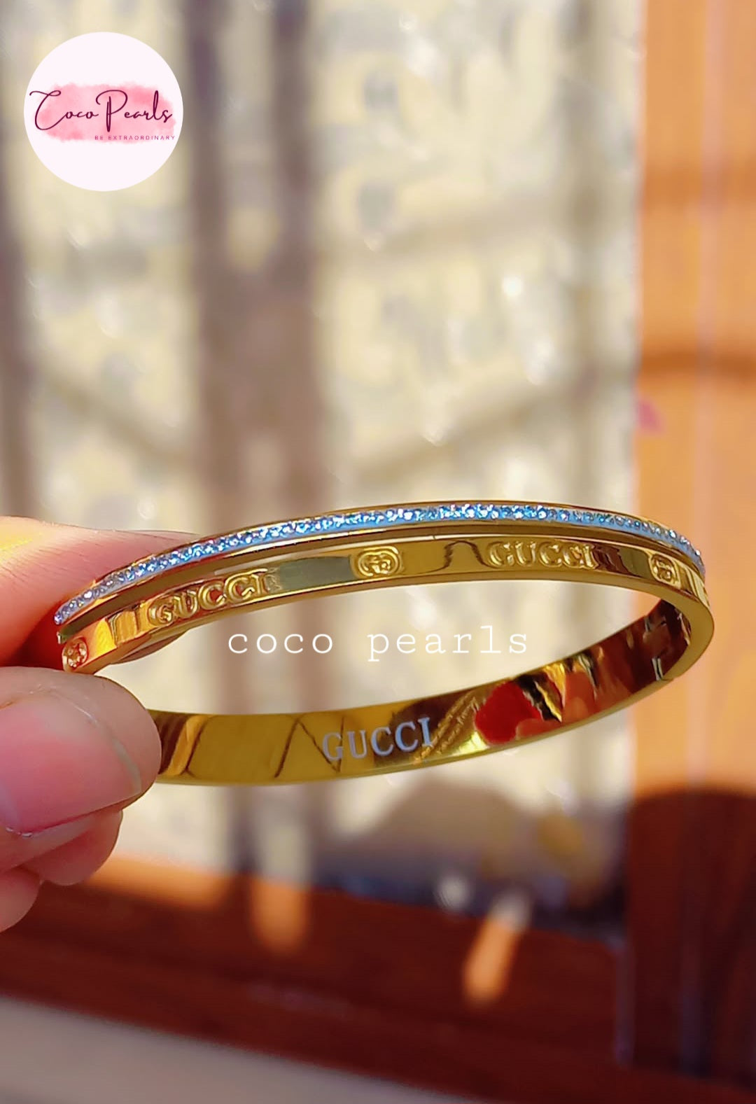Coco Pearls stainless steel anti tarnish golden luxury sparkle handcuff with diamond studded line displayed on hand