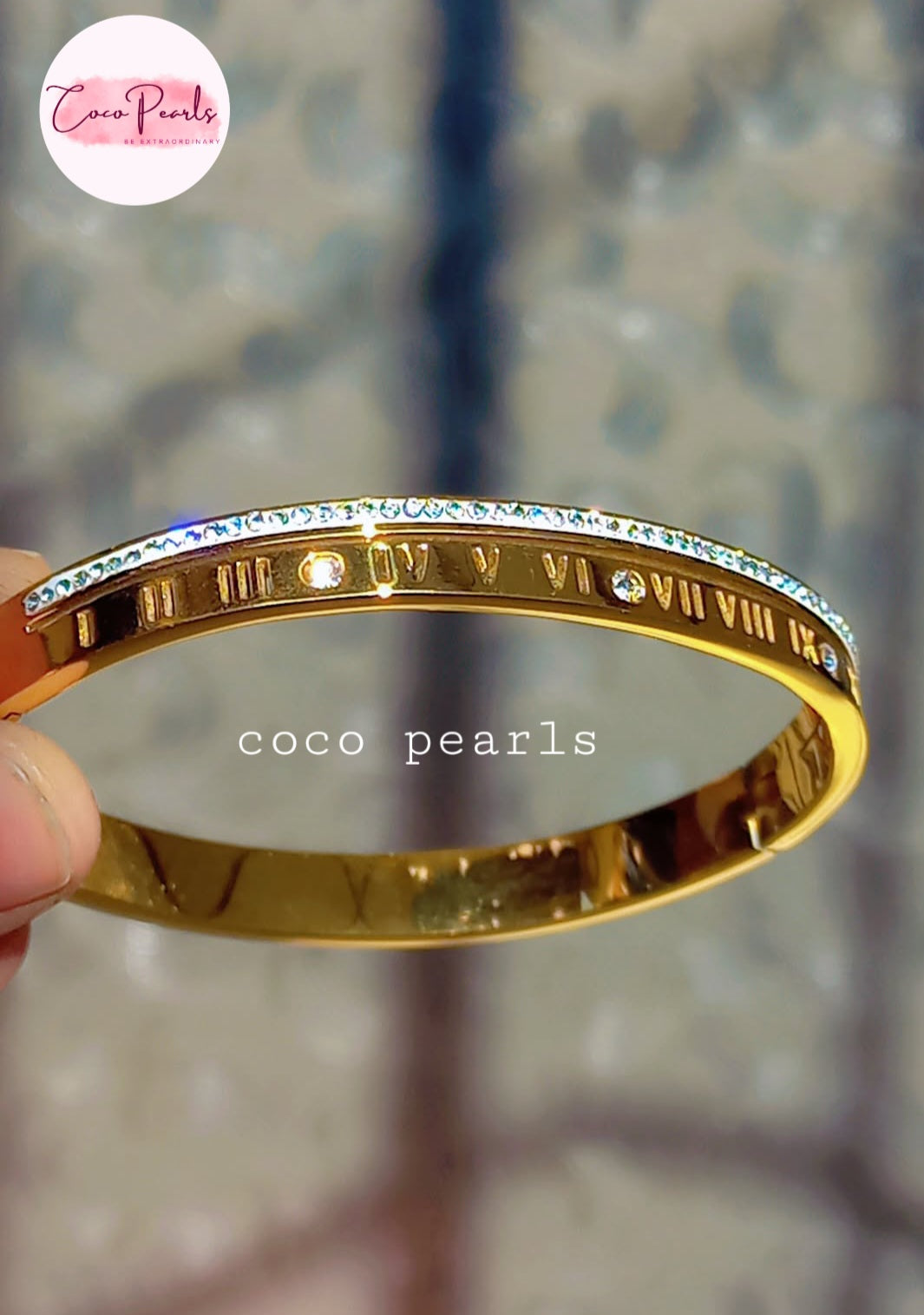 Coco Pearls stainless steel anti tarnish golden luxury sparkle handcuff with diamond studded line displayed on hand