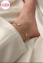 Coco Pearls Stainless Steel Anti Tarnish Gold pearl chain anklet with pearls on a ankle against a white fabric background