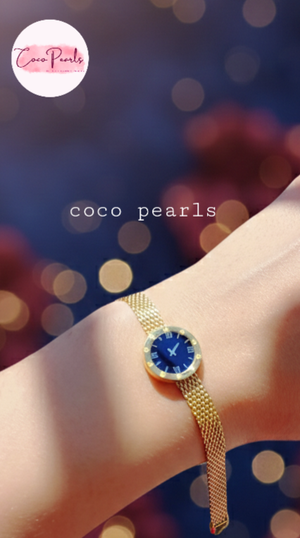 Coco Pearls Stainless steel Ani Tarnish Gold roman fake watch mesh bracelet with a black fake watch center displayed on hand