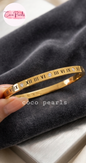 Coco Pearls Stainless Steel Anti Tarnish Gold roman handcuff bangles with Roman numeral design on a wooden surface