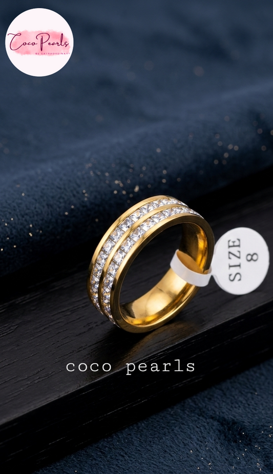 coco pearls stainless steel anti tarnish golden shimmering elegance ring displayed on dark background